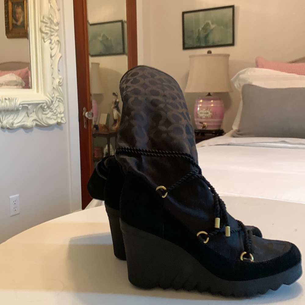 Coach black boot. Can wear up or folded down. Have been worn ONE time! Size 7.5